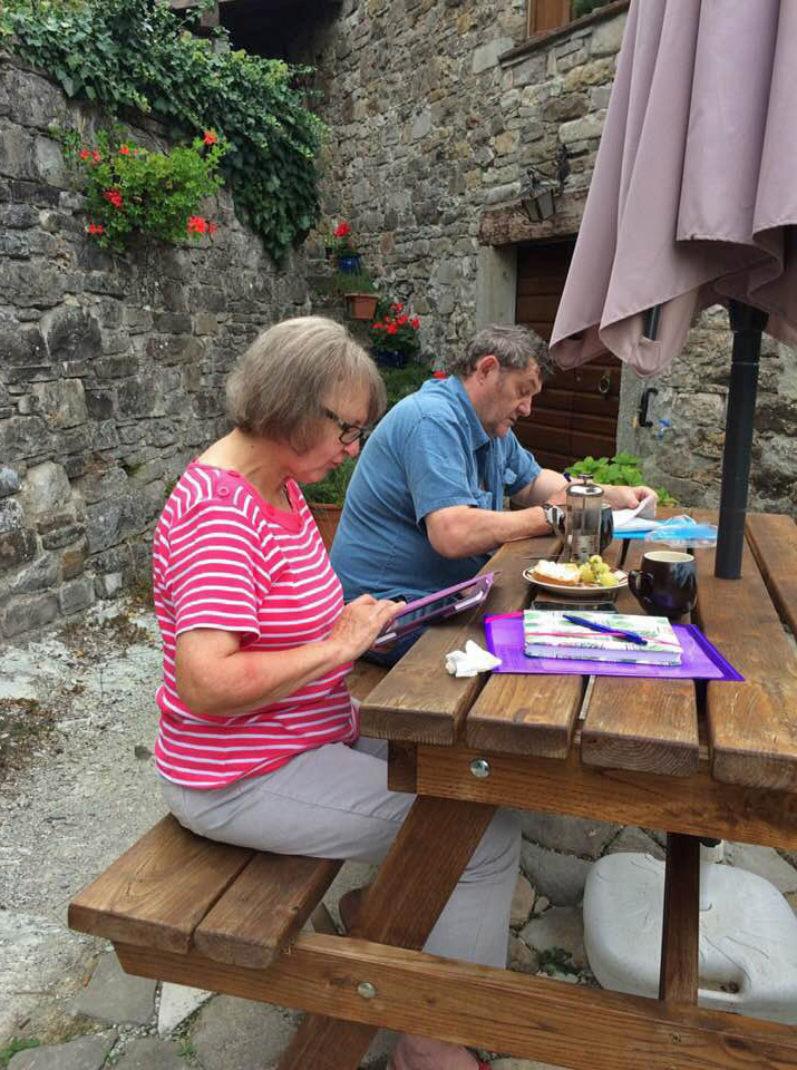 Two participants writing outside